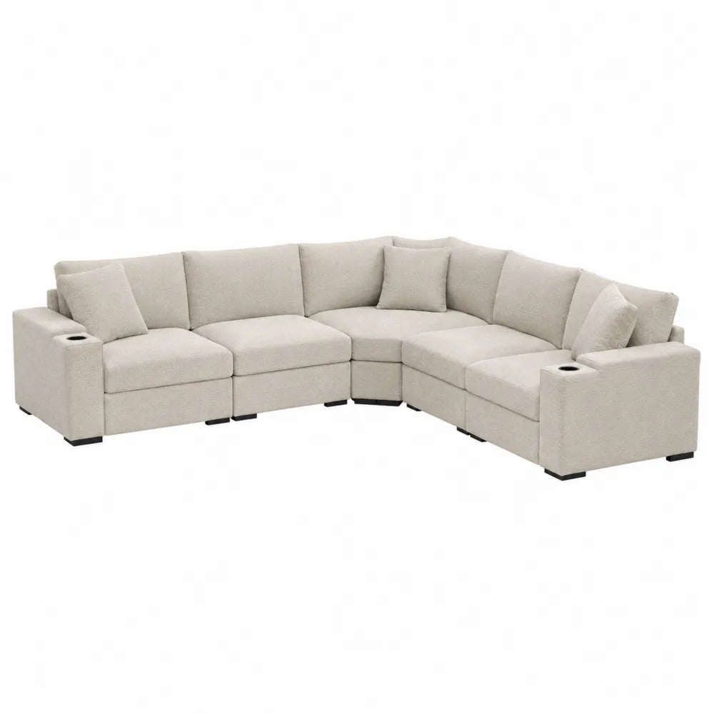 Sofa modułowa beżowa z tkaniny z poduszkami i uchwytami na napoje